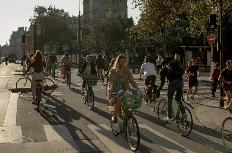 People riding their bikes on the cross of Rue de Rivoli and boulevard Sebastopol — two main bicycles lanes in central Paris during the morning rush hour, in September.