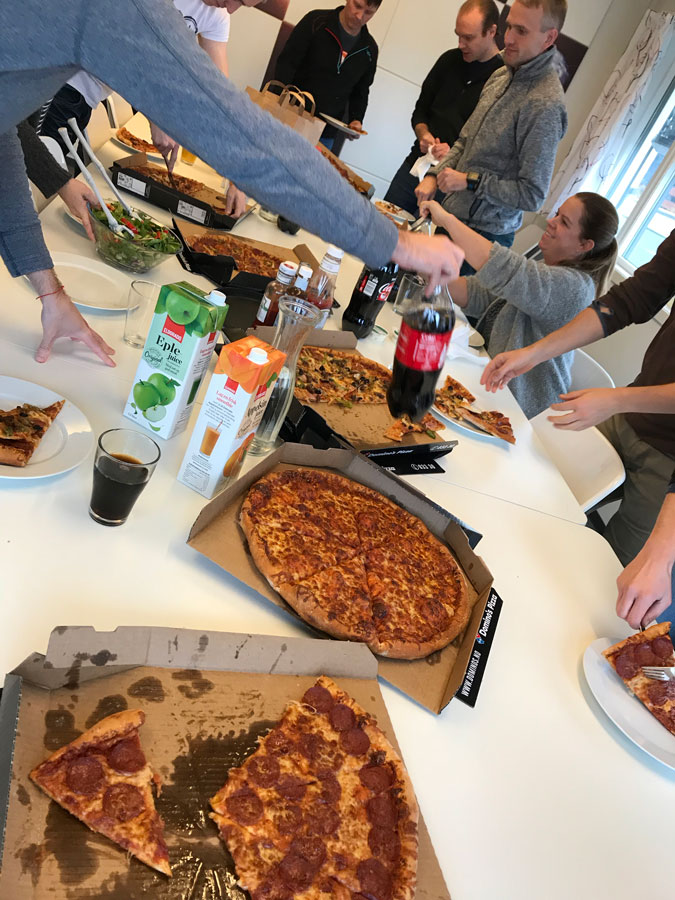Employees having pizza