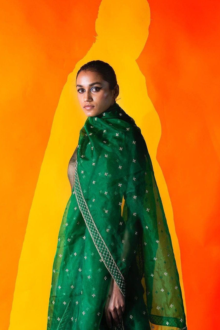 Image may contain Clothing Apparel Sari Silk Human and Person