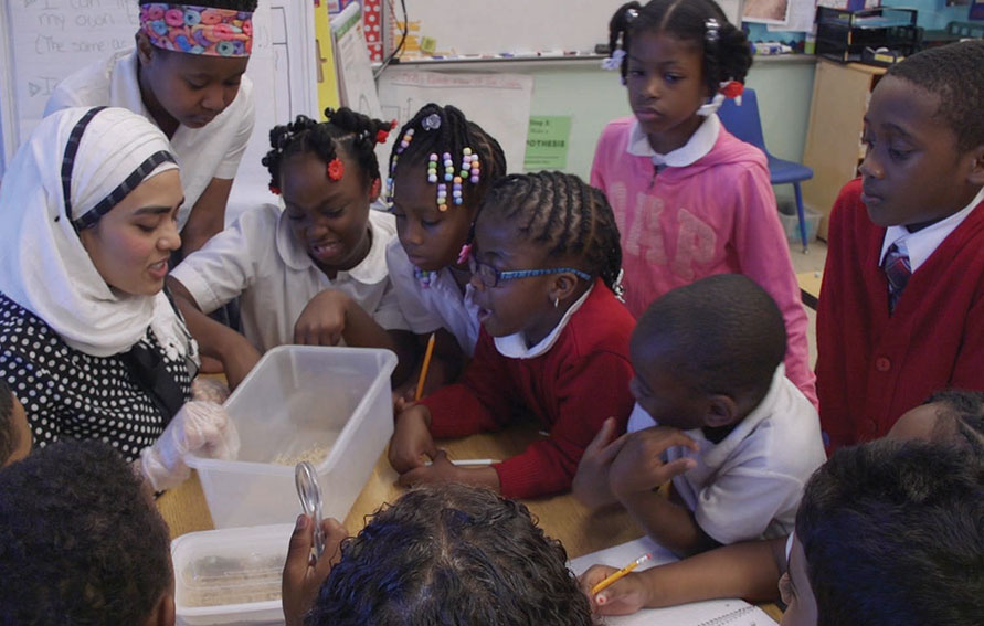 Student teacher with Elementary School Students