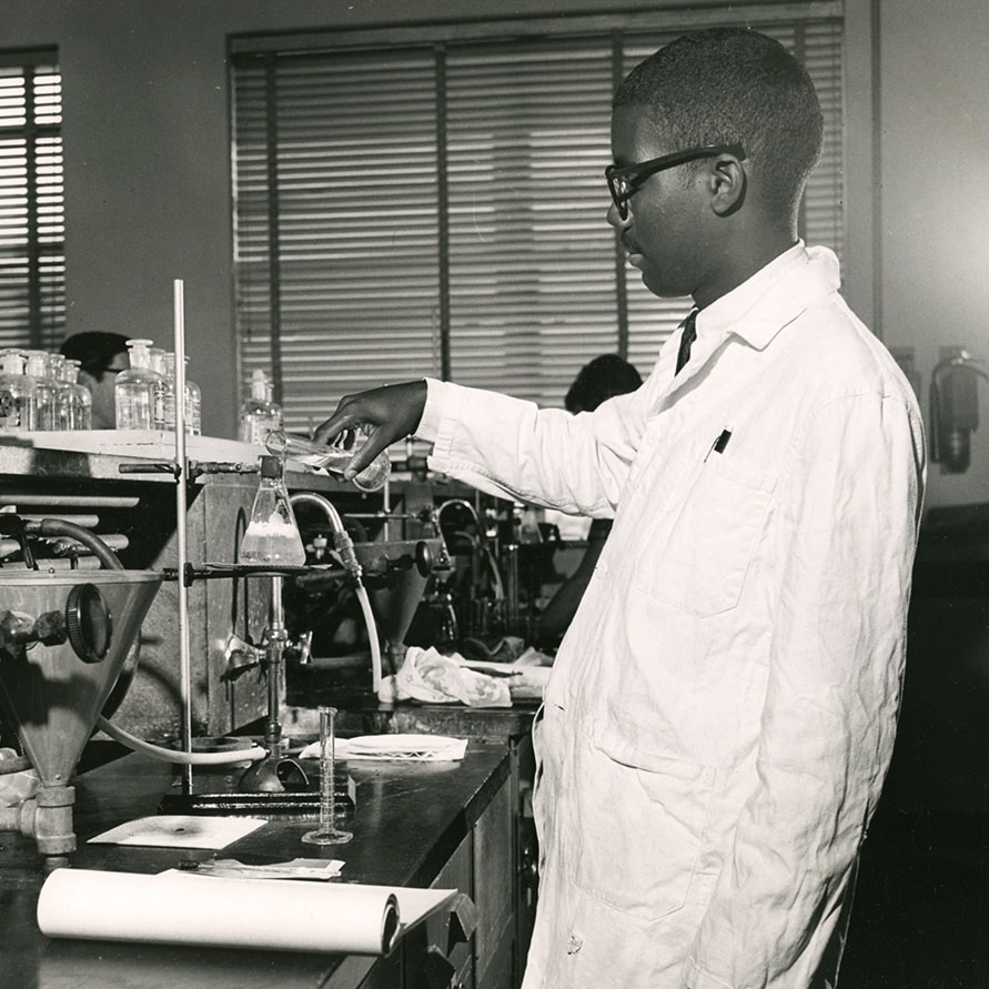 Queens College student in a science lab, 1970s