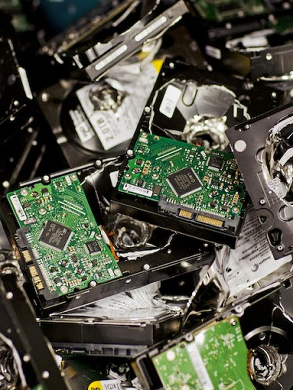 Closeup of many small circuit boards in a pile.