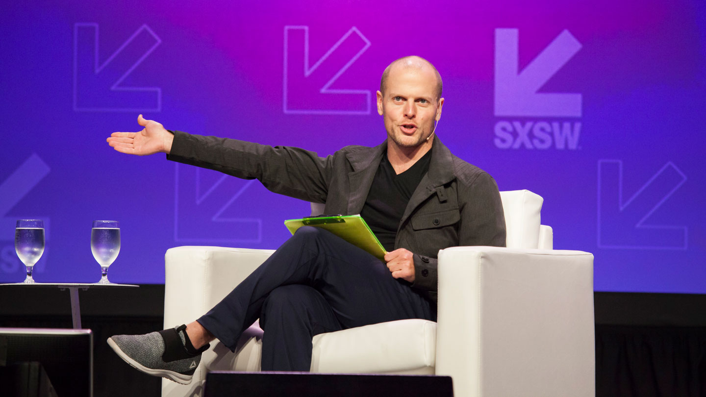 Tim Ferriss speaks onstage at 'The Tim Ferriss Show LIVE with Cheryl Strayed' - SXSW 2017. Photo by Samantha Burkardt