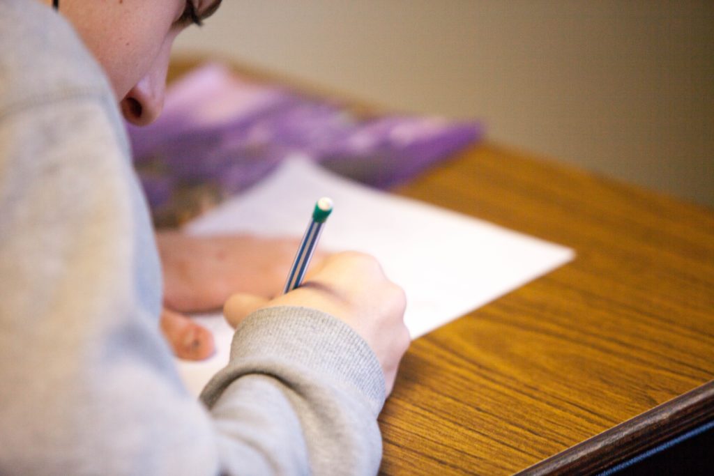 student taking a test in school