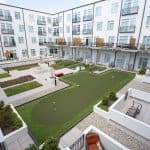 apartment courtyard with putting greens (Photo by Eldon Lindsay)