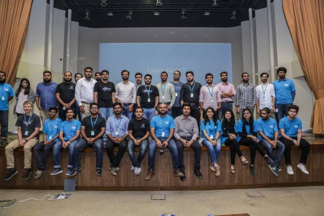 Abdullah Ramzan among a group of community members at WordCamp Karachi 2018