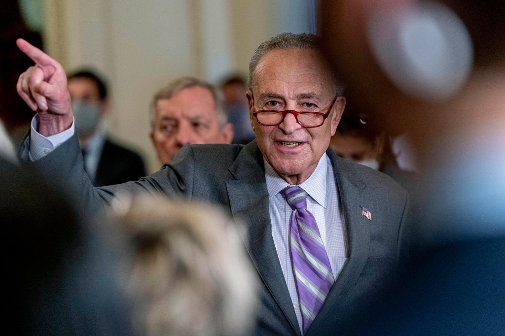 Senate Majority Leader Chuck Schumer of N.Y., speaks to reporters after a Democratic policy meeting at the Capitol in Washington on Oct. 5, 2021.