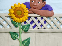 Plasticine art by Barbara Reid boy with a sunflower