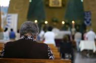 woman praying in church