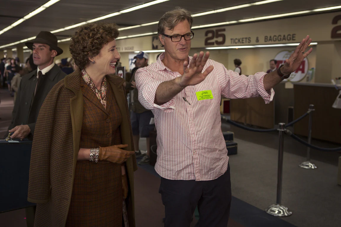 Actor Emma Thompson (as P.L. Travers) and director John Lee Hancock behind-the-scenes in the movie "Saving Mr. Banks".