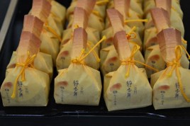 Food treats served in wrapped paper - Japan - photography by Brent VanFossen.