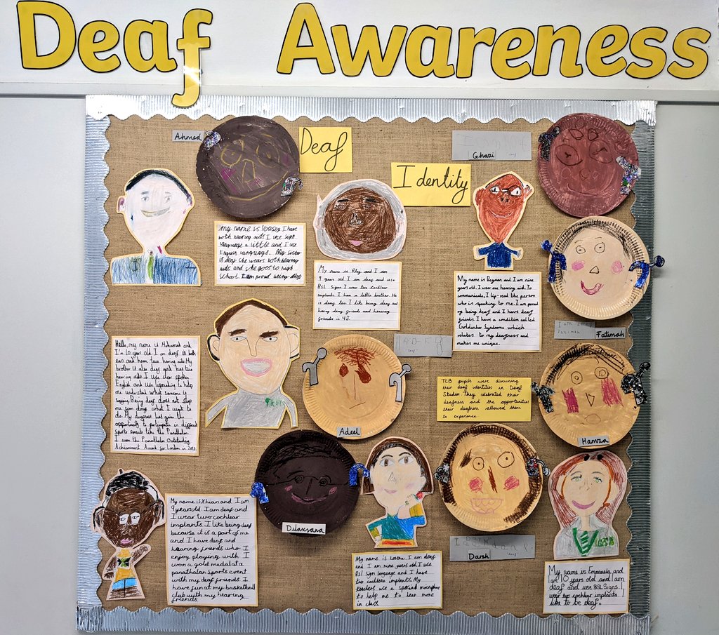 Children have drawn self portraits representing hearing aids and cochlear implants and written what deaf identity means to them