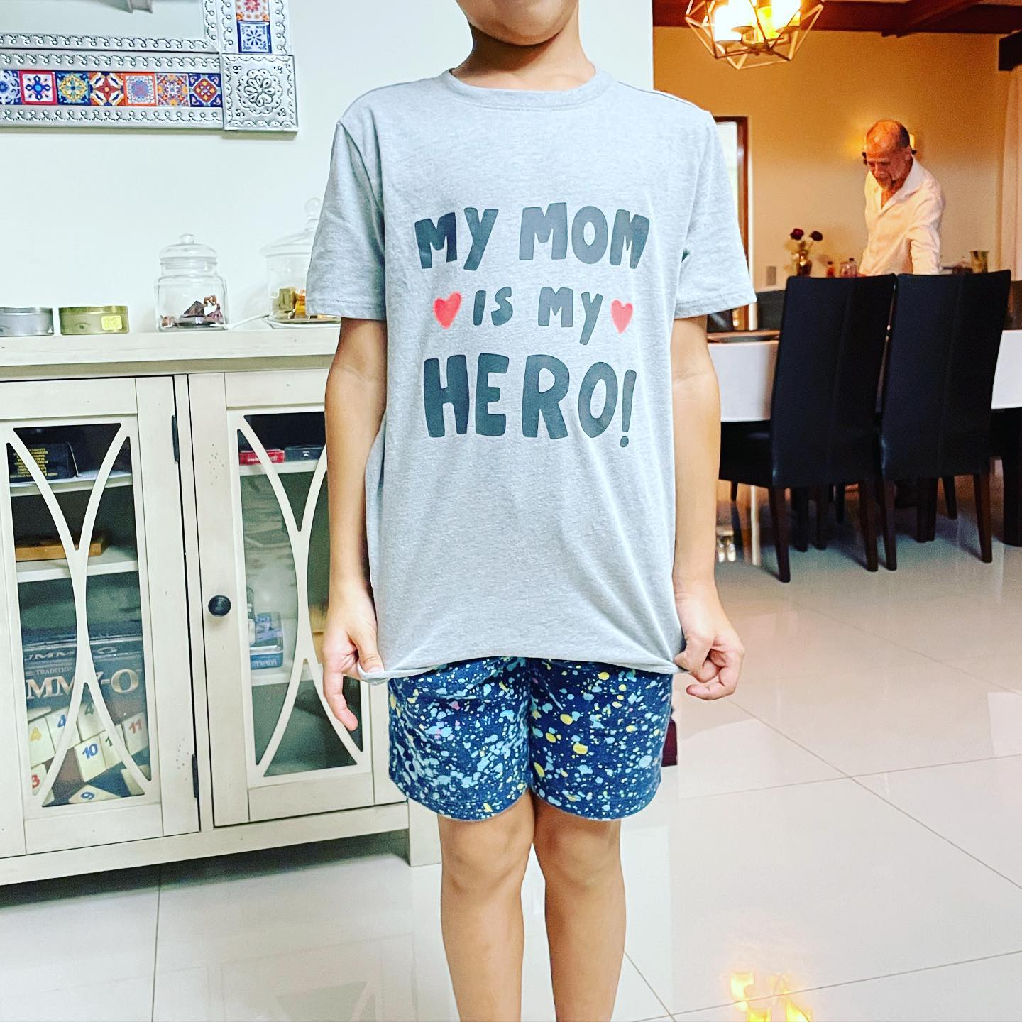 a man standing in a kitchen