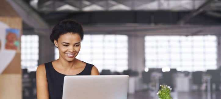 Woman in an industrial building creating a winning website