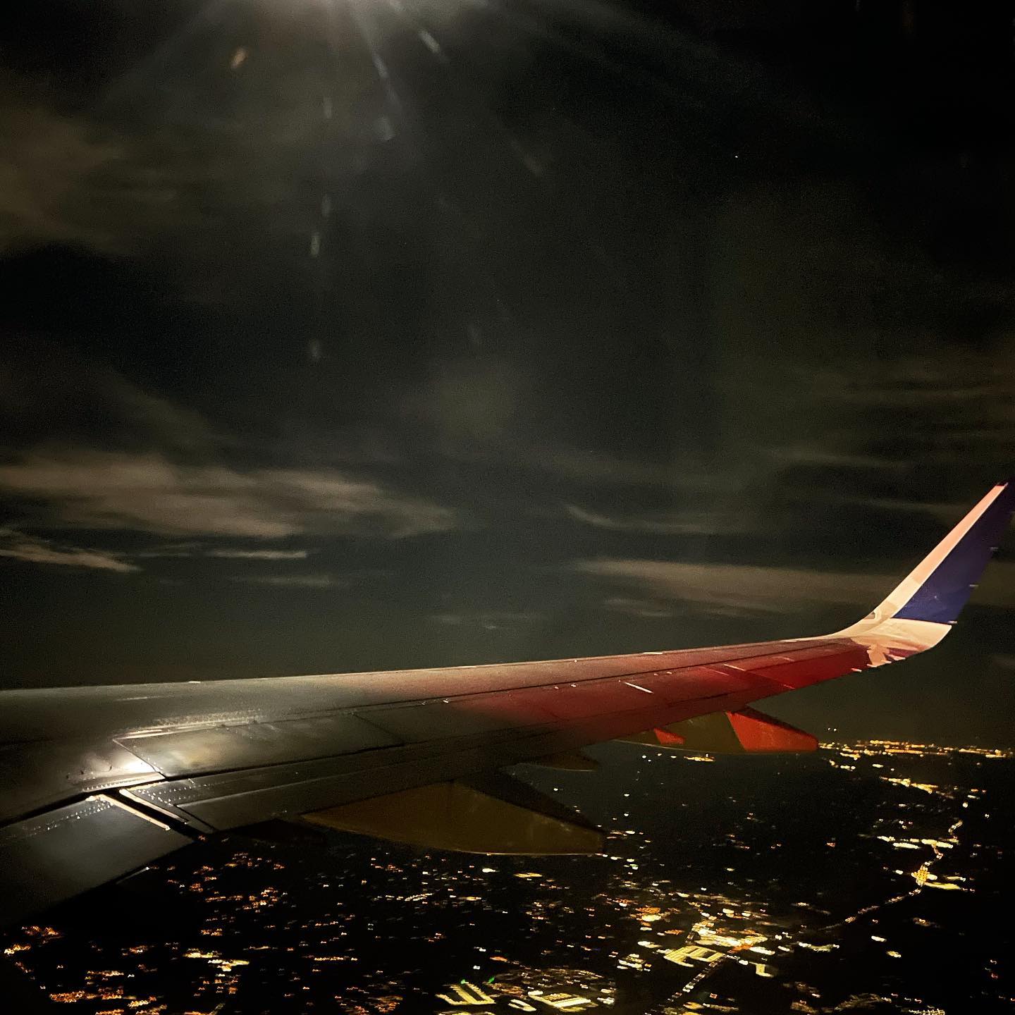 a plane flying over a body of water