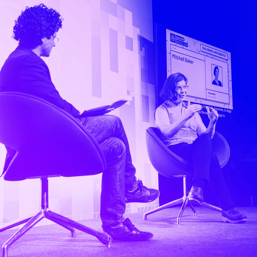 A photograph of Mitchell Baker being interviewed onstage at Mozilla Festival 2018.