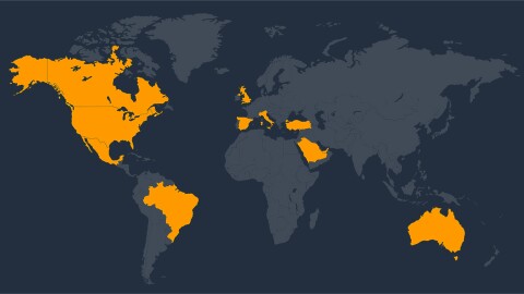 A dark blue image of an international map with bright orange colors highlighting some countries.