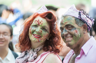 Woman and man with zombie makeup at Sydney Zombie Walk.