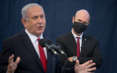 Prime Minister Benjamin Netanyahu and Public Security Minister Amir Ohana in Tel Aviv, on December 1, 2020. (Miriam Alster/Flash90)