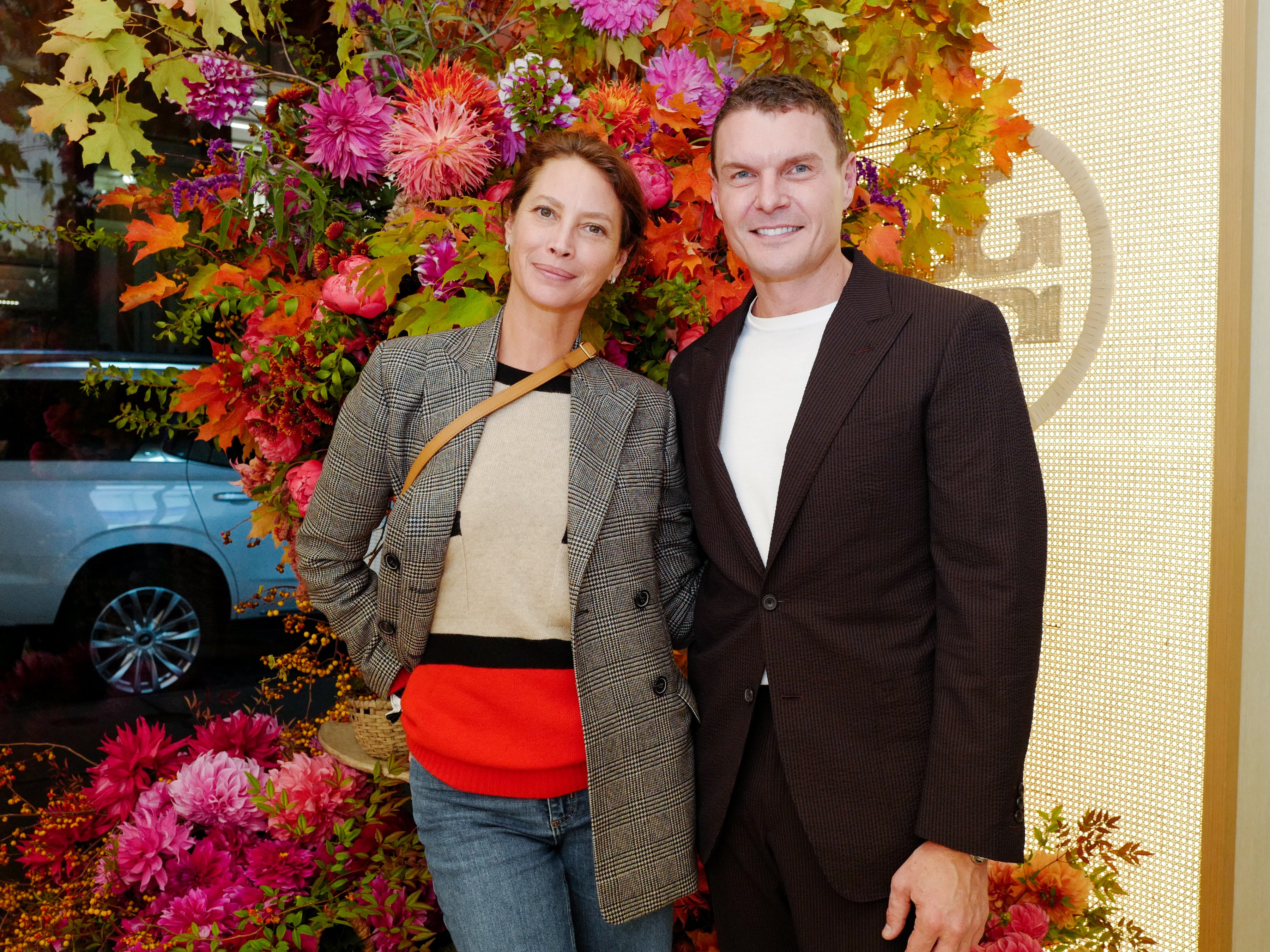 Image may contain Plant Christy Turlington Human Person Flower Blossom Flower Bouquet Flower Arrangement and Vehicle