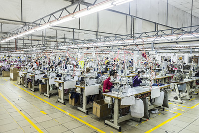 sewing-machine workers in factory