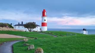 The Souter Lighthouse at the end of a path in Marsden, Tyne & Wear