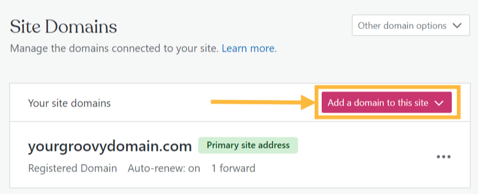 Indicating the Add A Domain to this site button in the top right of the Domains page.
