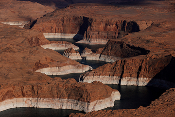 In this aerial view, the tall bleached "bathtub ring" is visible on the rocky banks of Lake Powell on June 24 in Page, Arizona.



