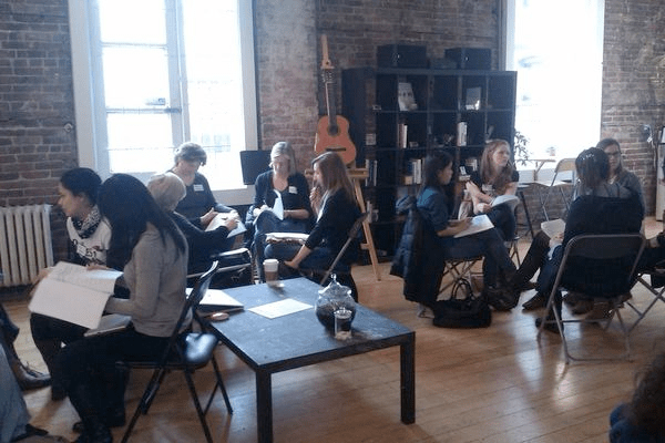 women gathering to discussion presentation topics