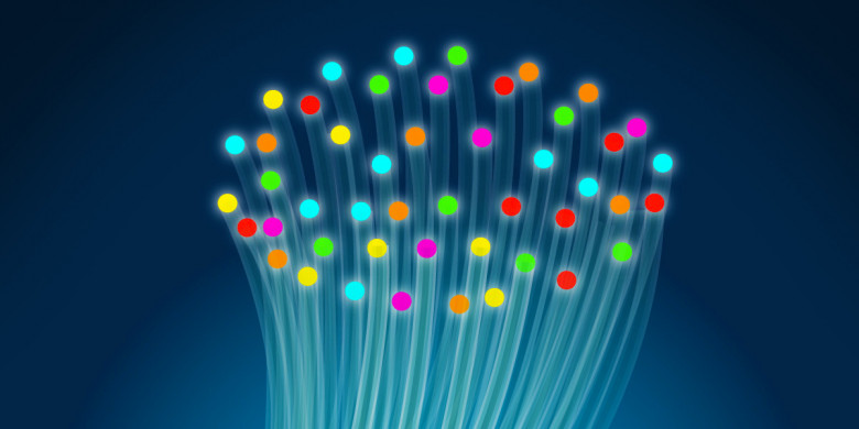 A closeup drawing of a fiber cable, with rainbow colors