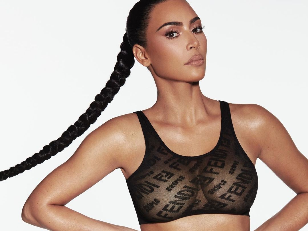 Image may contain Clothing Apparel Human Person Lingerie Underwear Kim Kardashian and Bra