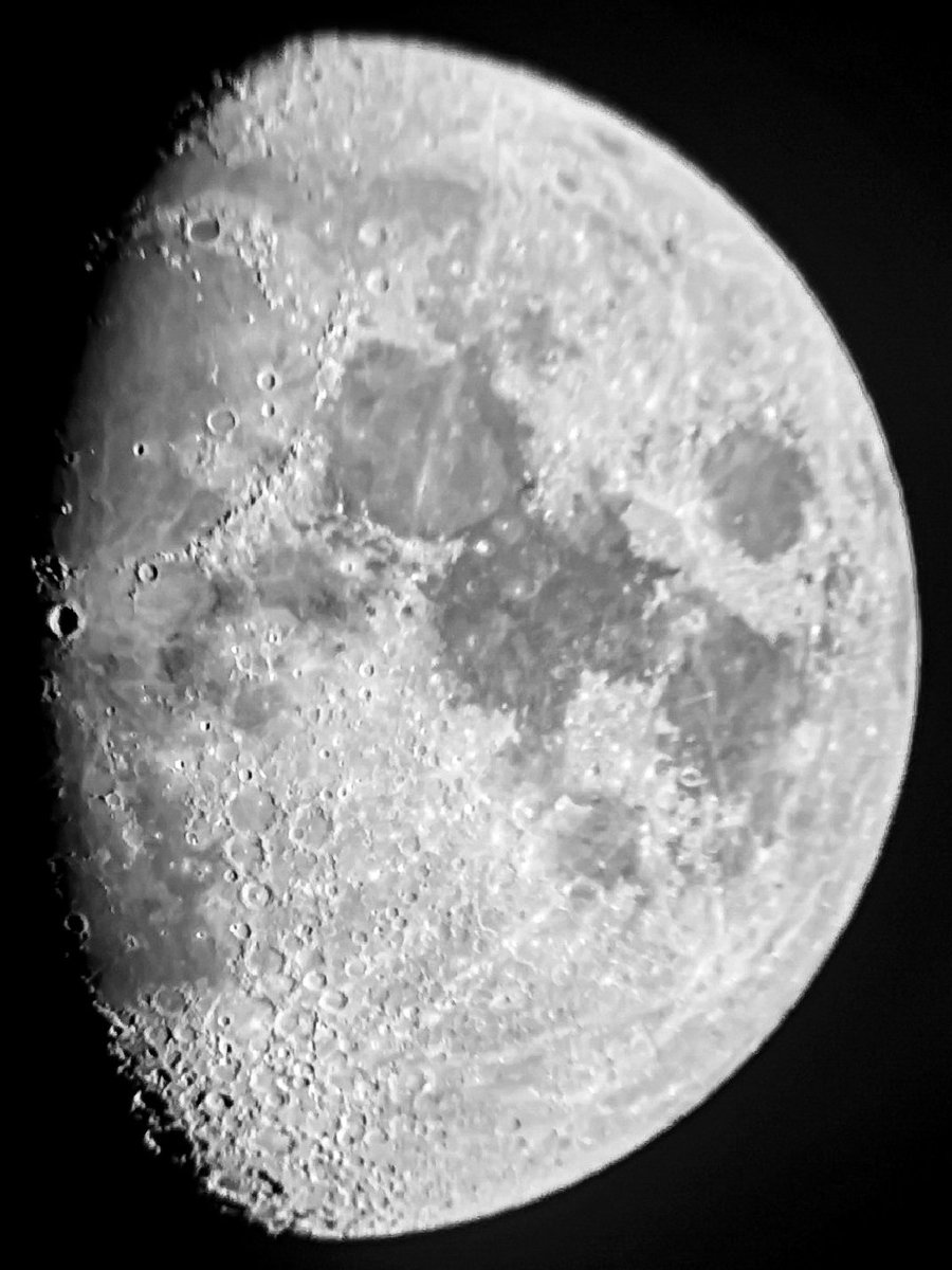 Closeup photo of the Moon in the Waxing Gibbous phase.