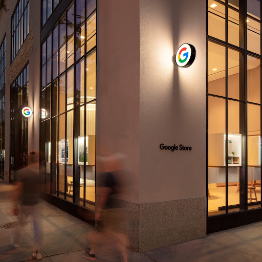 Nighttime photo of the Google Store building in Chelsea, New York.