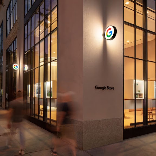 Nighttime photo of the Google Store building in Chelsea, New York.