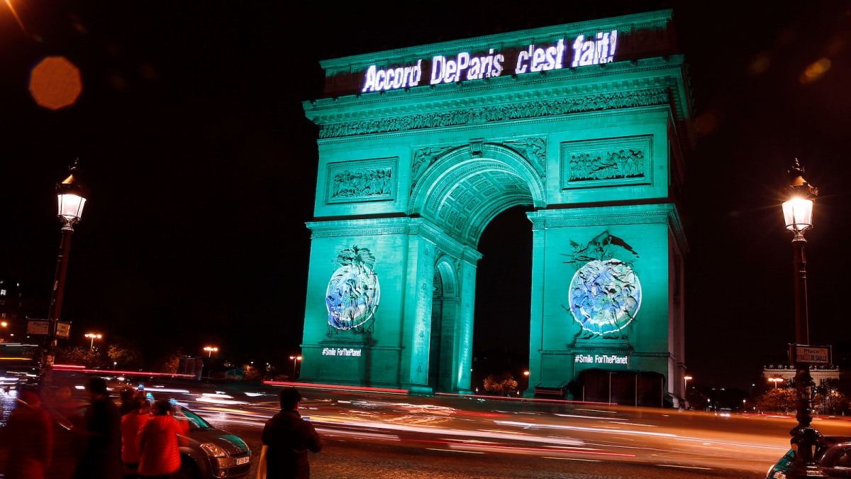 The Arc de Triomphe illuminated with the words 