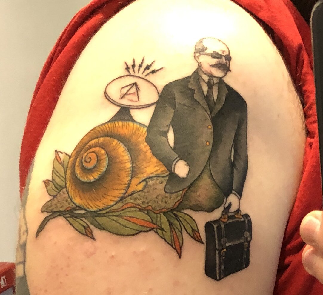 Ian snail tattoo