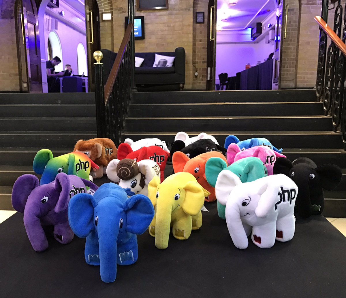 Bunch of elephpants at the bottom of some steps