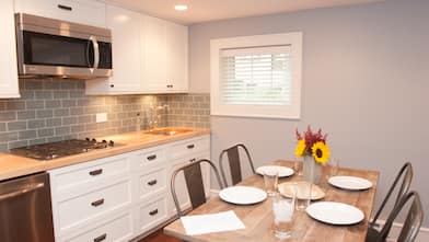 basement kitchen remodel with stove and subway tile for family