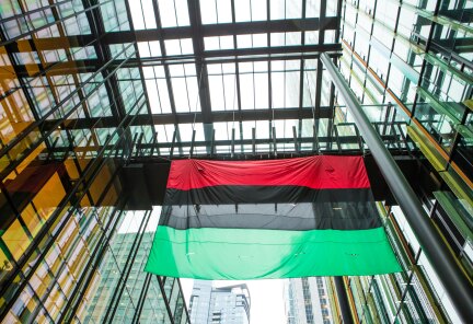 Black Employee Network Flag Raising at an Amazon Building
