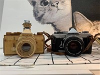 Vietnamese shop crafts brilliant wooden camera models with interchangeable lenses