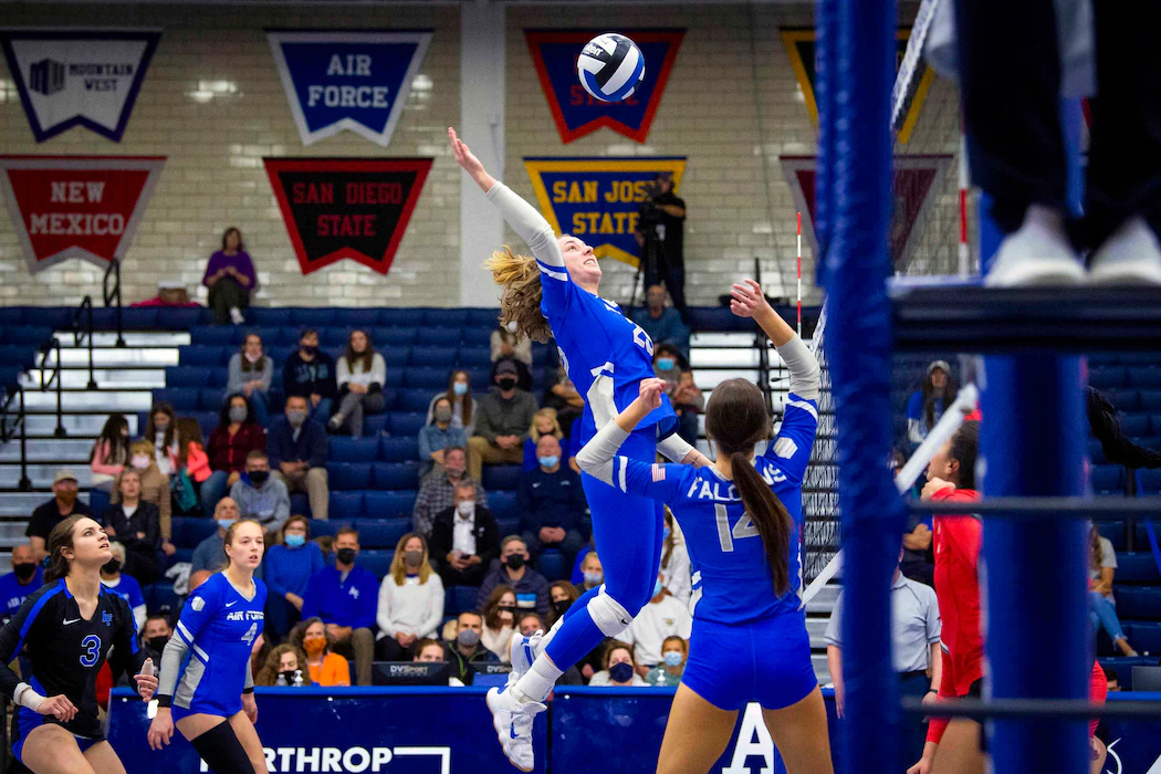 A U.S. Air Force Academy cadet spikes a volleyball