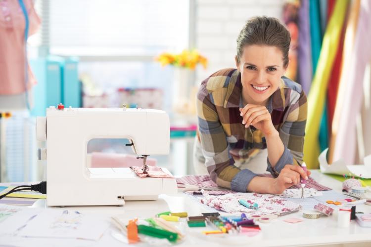 Woman with a sewing machine.