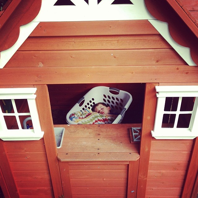 Inside his cedar play house.