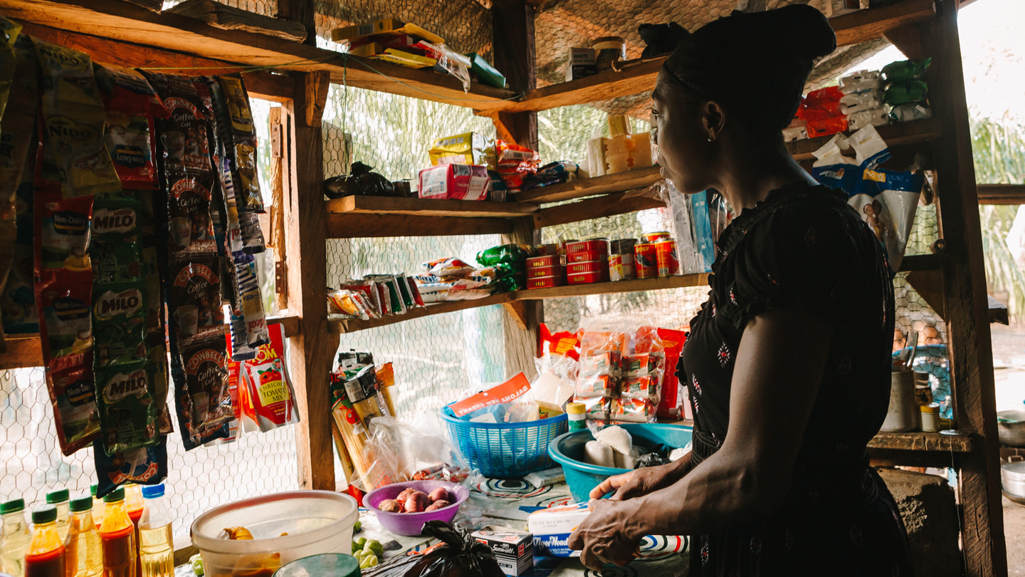 Model of Hope program volunteer Rebecca working inside her shop.