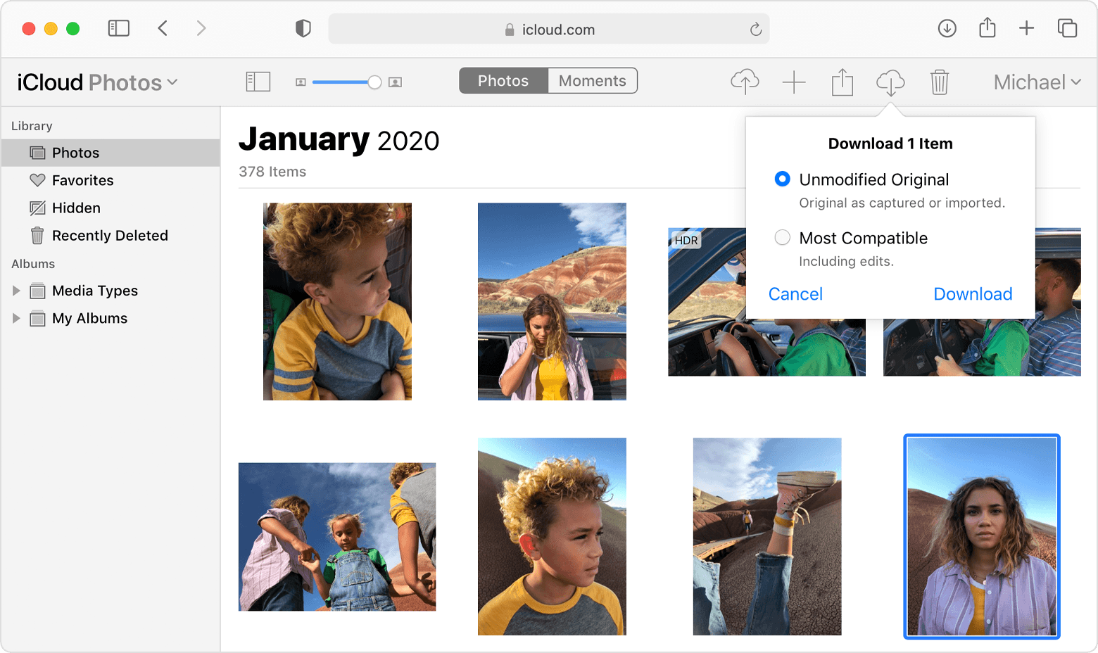 Safari browser window showing iCloud Photos download options
