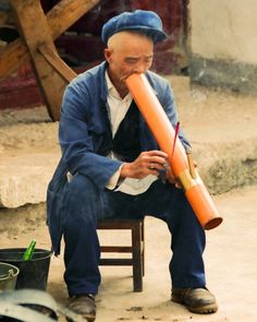 A bamboo pipe works as a water pipe for this man smoking local tobacco in Guizhou China. Photo from my book #VanishingAsia #China #waterpipe Man Smoking, Water Pipes, This Man, Bamboo, Asia, Books, Libros, Water Fed Pole, Book