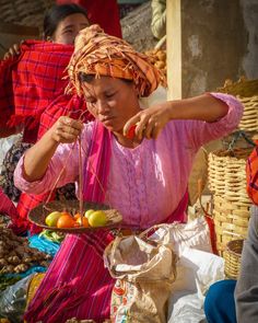 Using the ancient technology of a balance scale a vegetable farmer in Myanmar sells her produce at a market near Inle Lake. Photo from my book #VanishingAsia #Myanmar Inle Lake, Image Shows, Farmer, Asia, Scale, Technology, Book, Weighing Scale, Tech