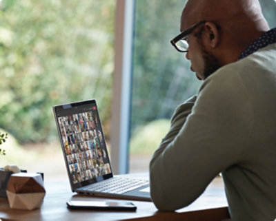 A person on a video call through Teams on their laptop