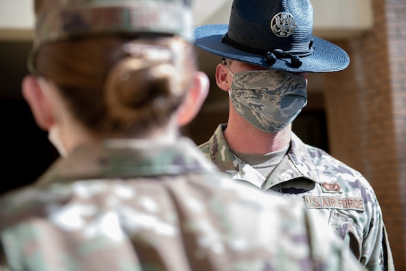 OTS Military Instructor performs open ranks during COVID-19 Pandemic.