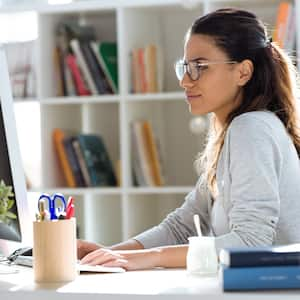 Woman working from home office